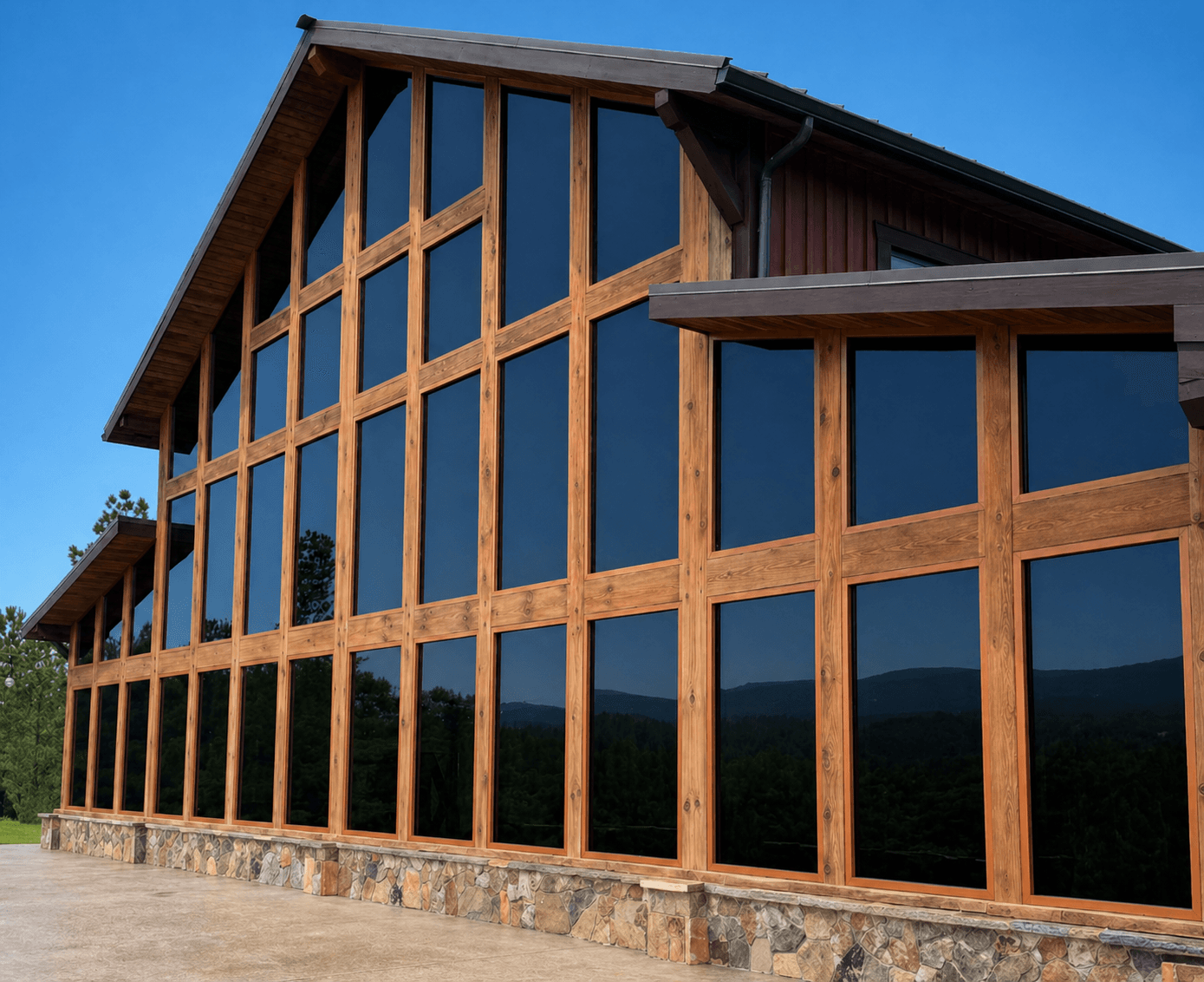 Commercial building with large glass facade and storefront glazing.