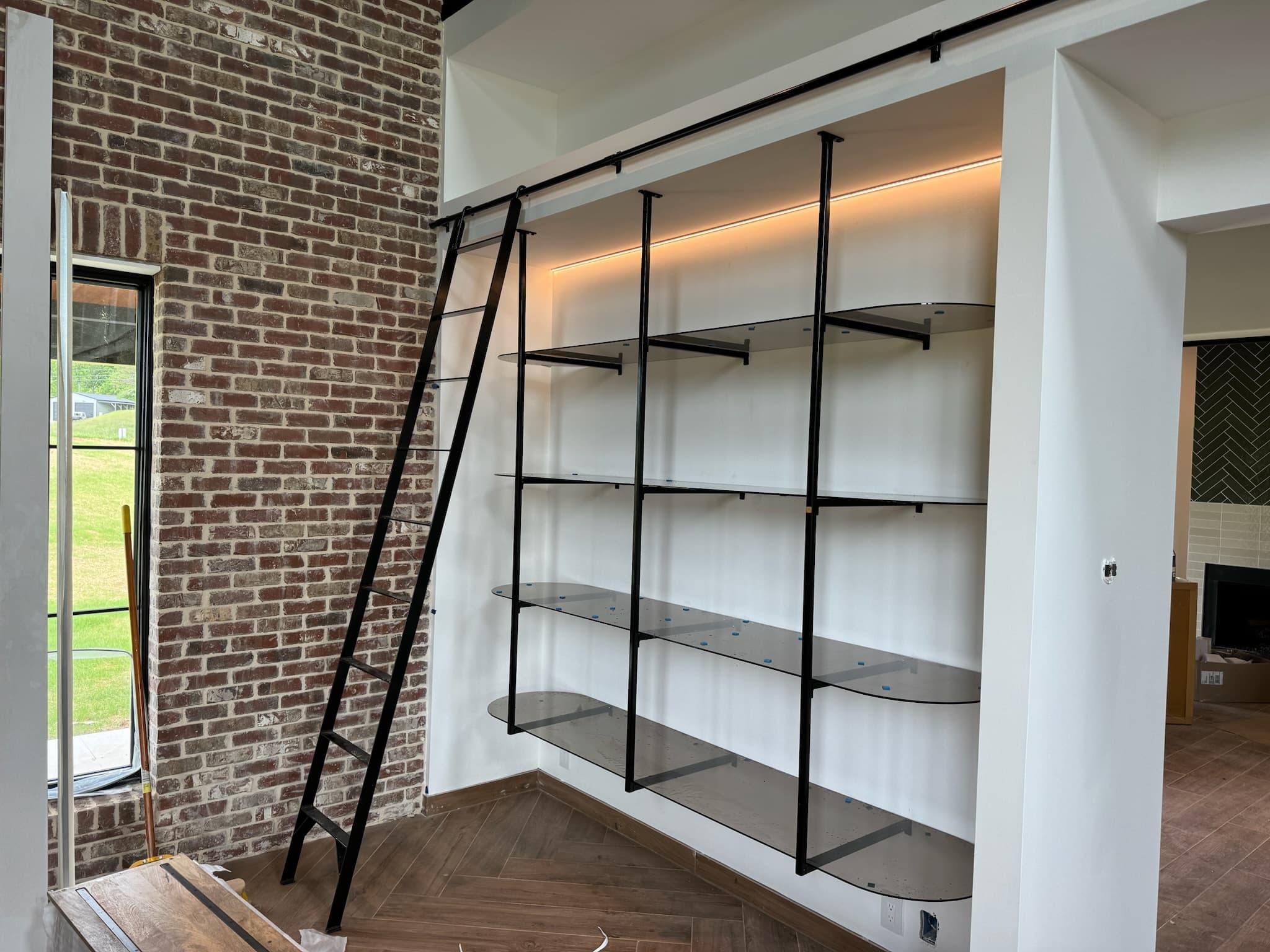 Custom closet built-ins—shelving, hanging rods, and drawer storage in a finished room.