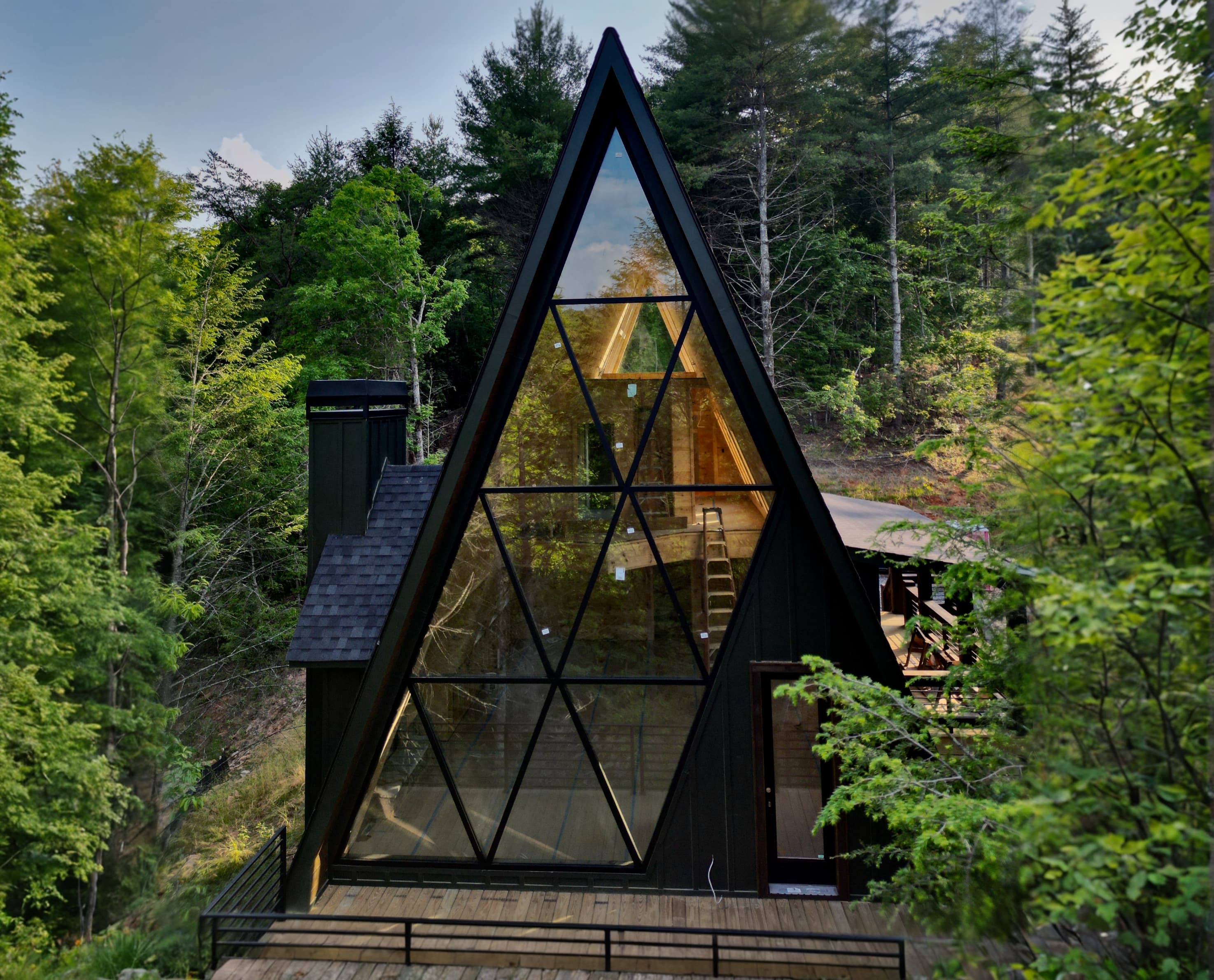 Building exterior with metal and glass entry—context for exterior metal railing and hardware work.