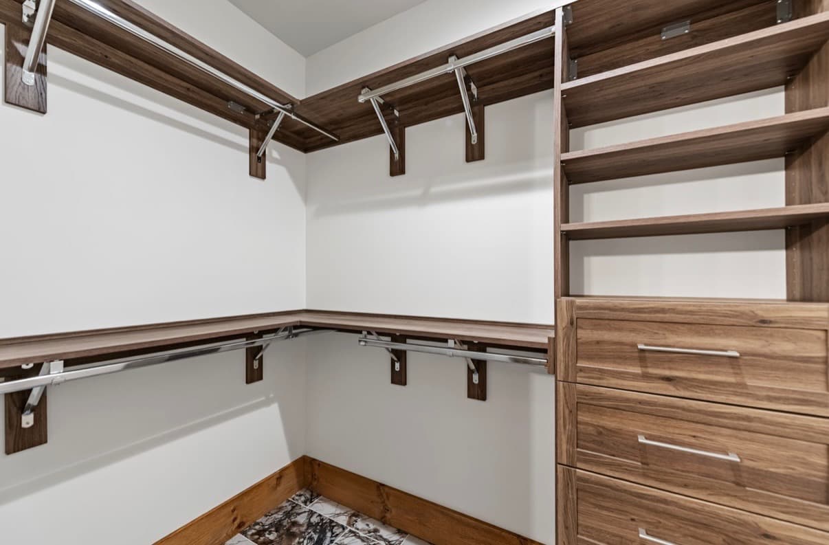 Custom closet built-ins—shelving and storage layout in a finished room.