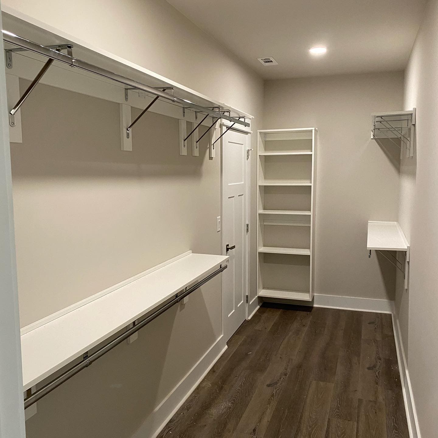 Custom closet design layout with drawers, shelves, and hanging zones.
