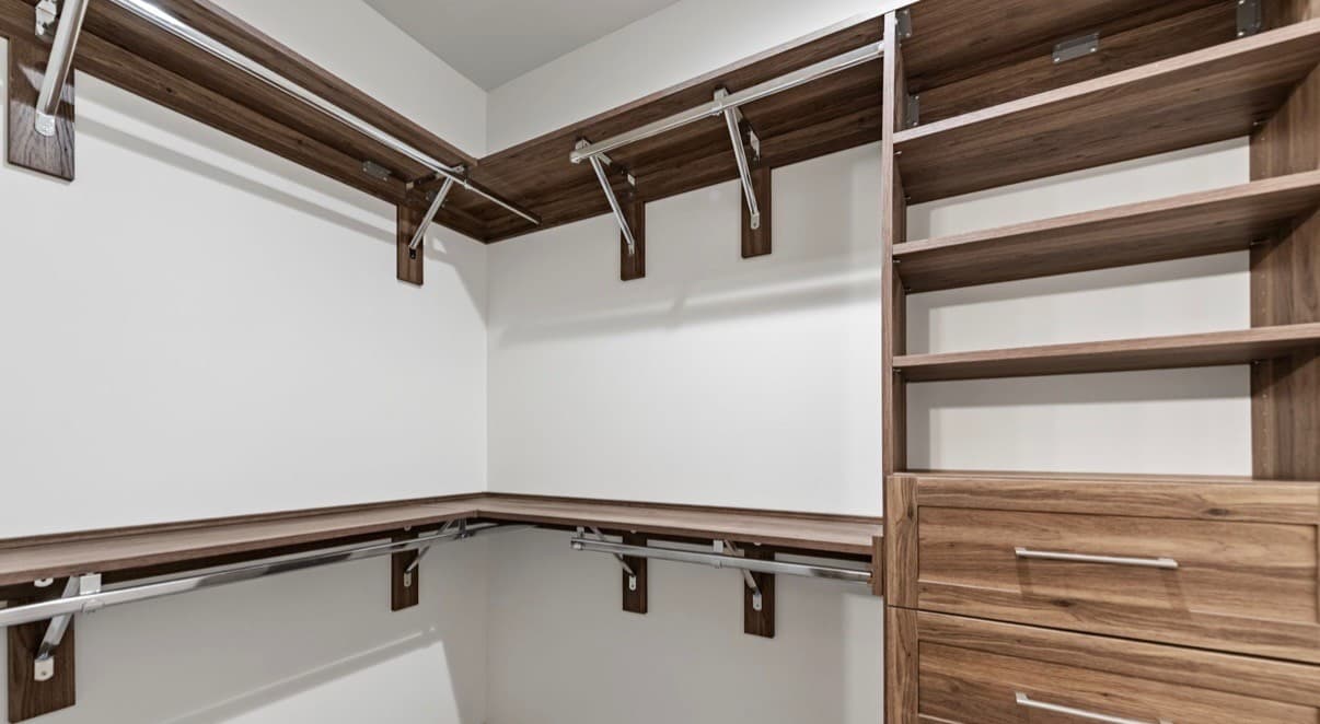 Custom closet design layout with built-in shelving and storage zones.