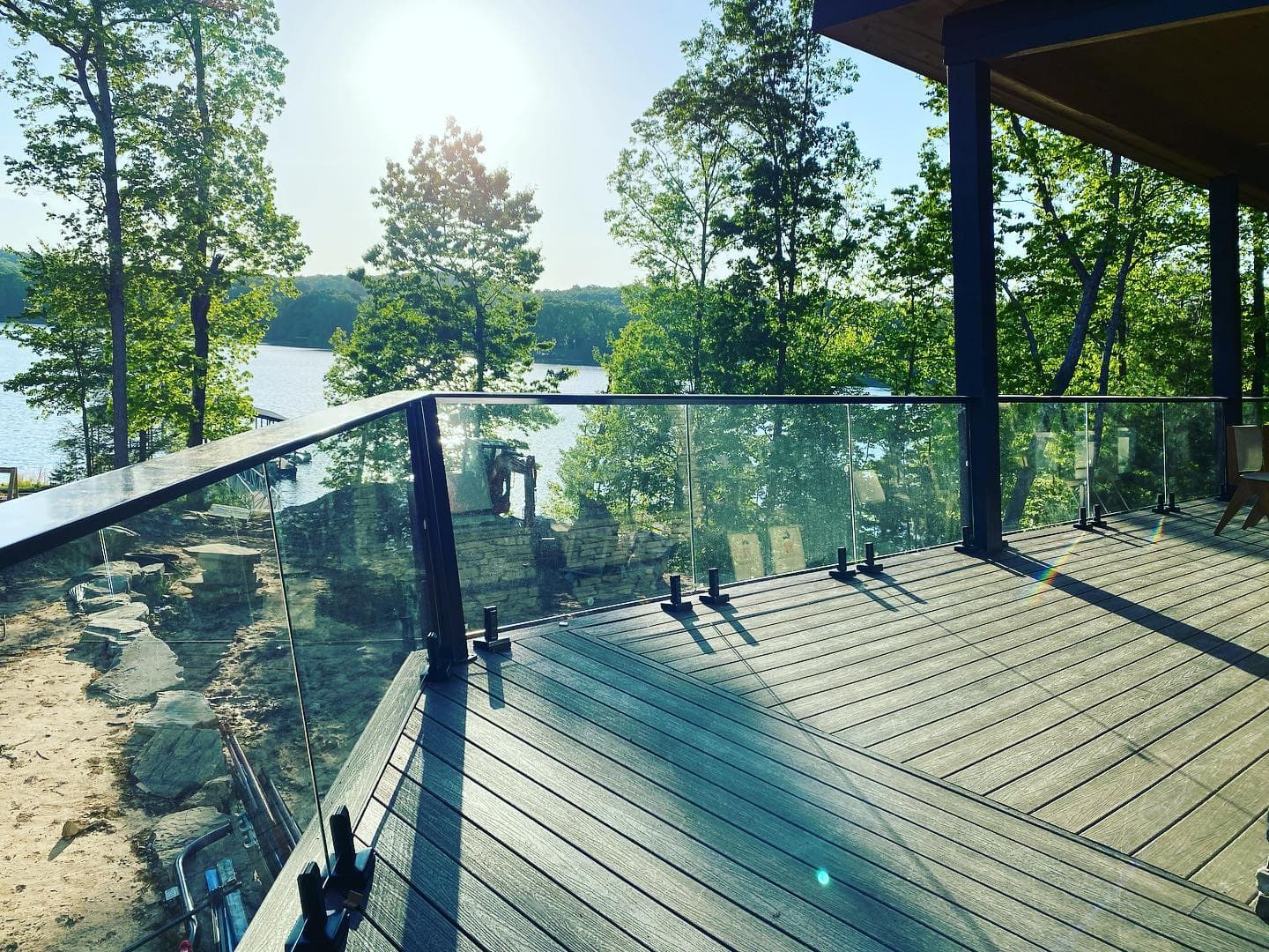 Exterior glass railing panels installed on a deck or balcony.