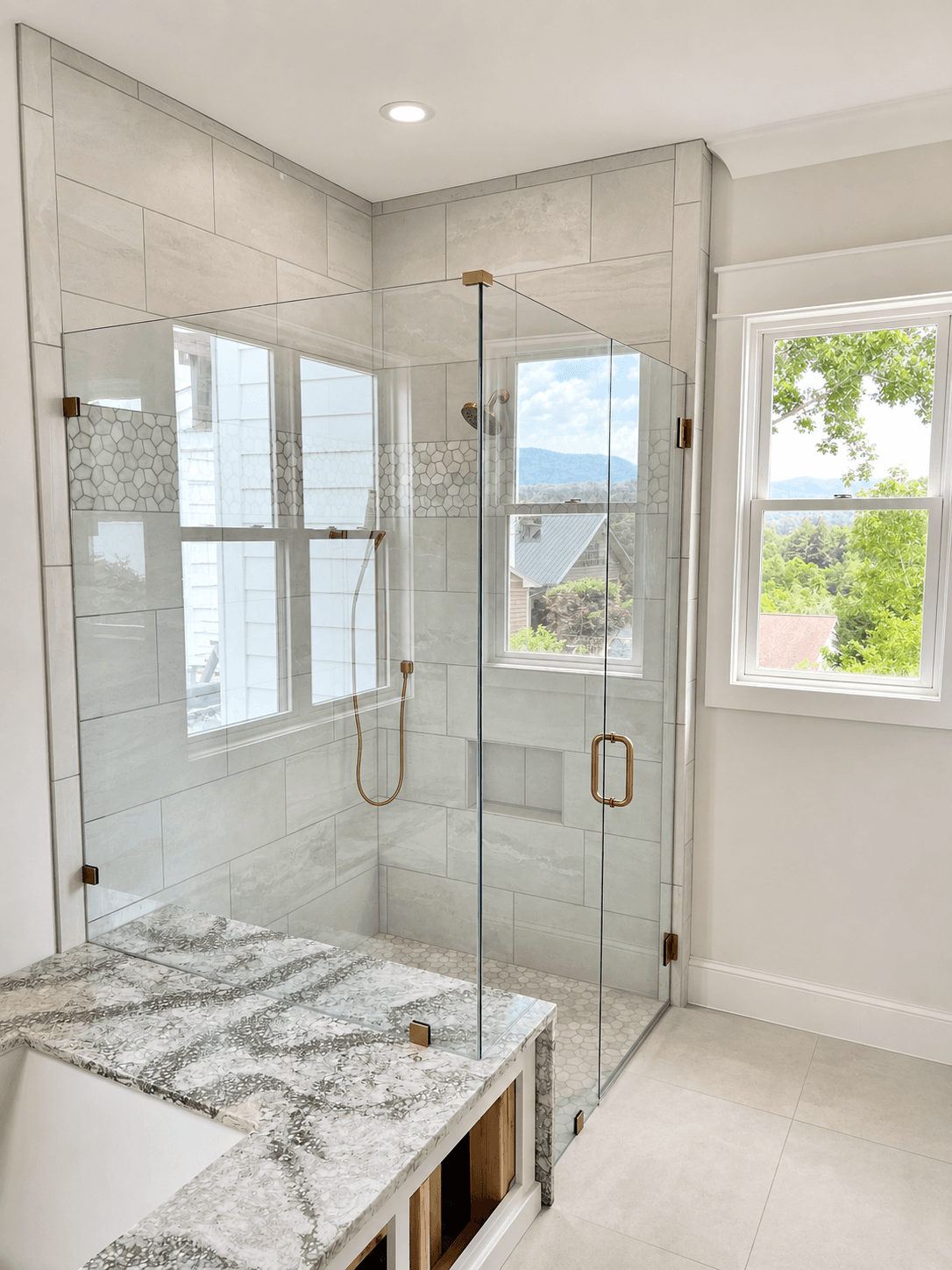 Frameless shower door installation.