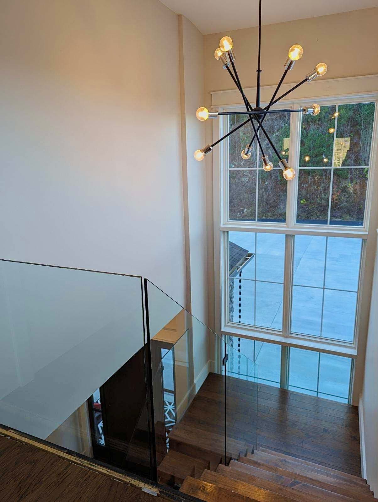 Laminated safety glass on a stair or guardrail opening.