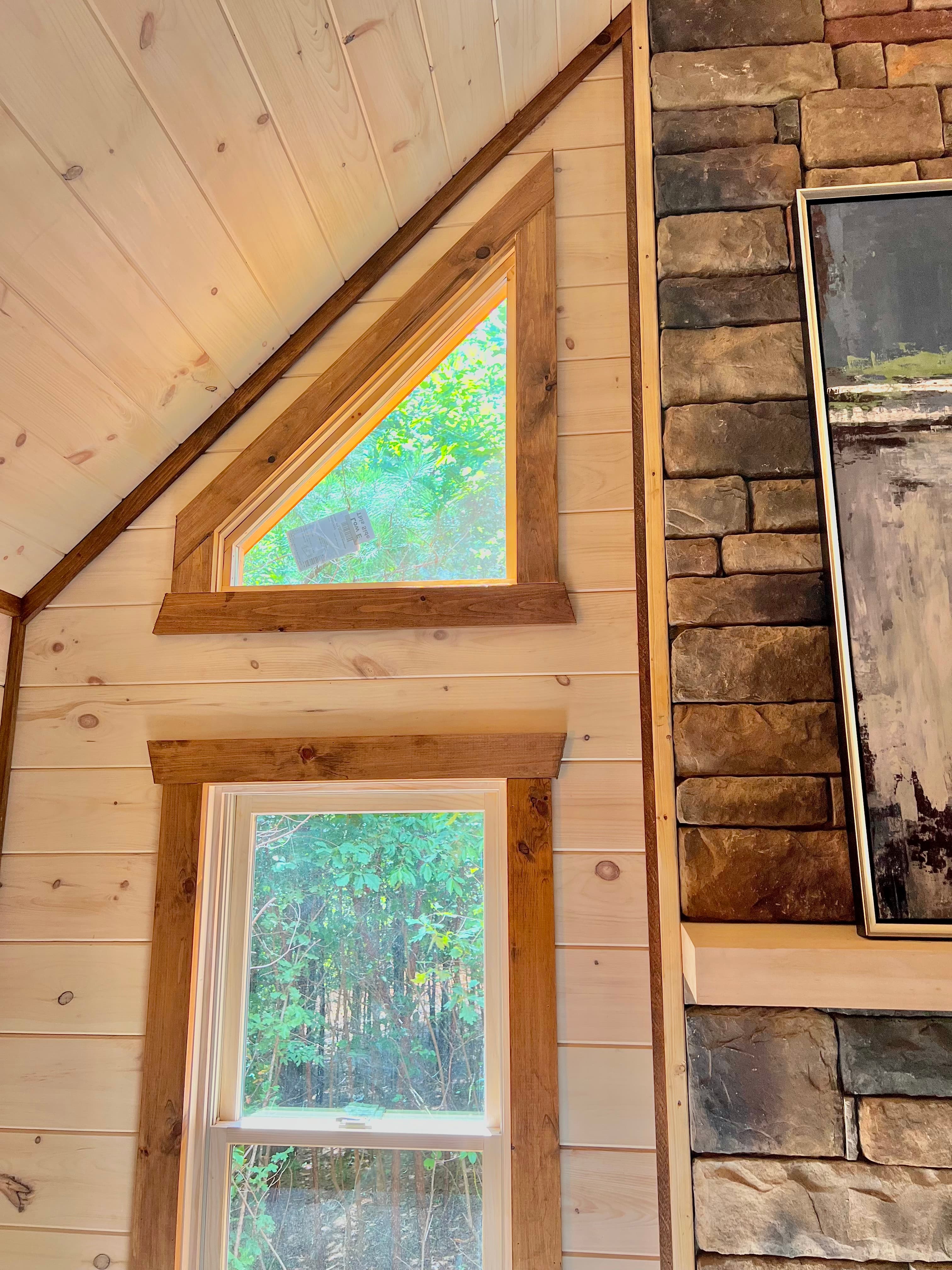 Residential window with replacement glass—clear lite, sash, and trim detail.