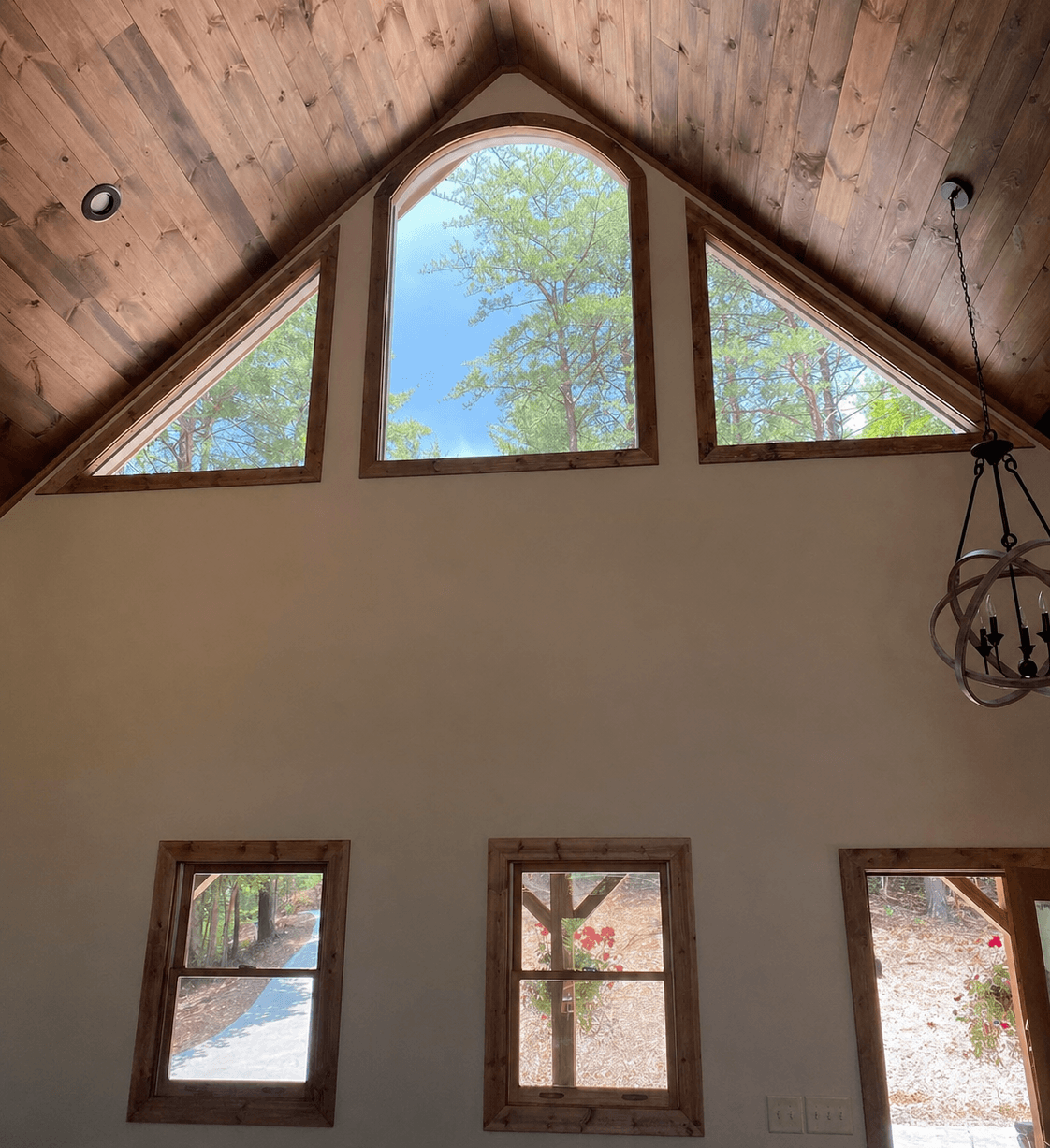 Residential window replacement on a home elevation.