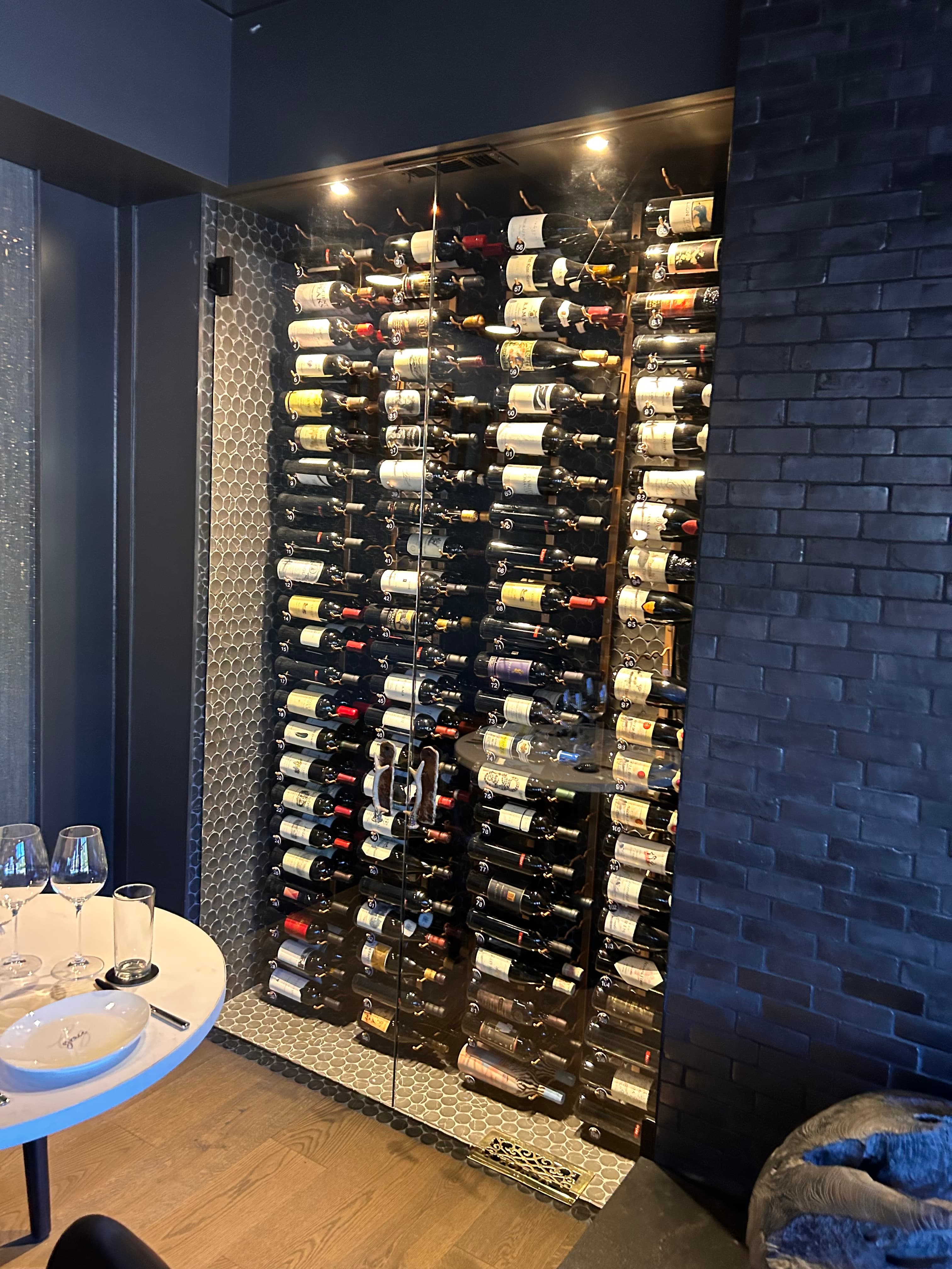 Custom glass wine storage installation.