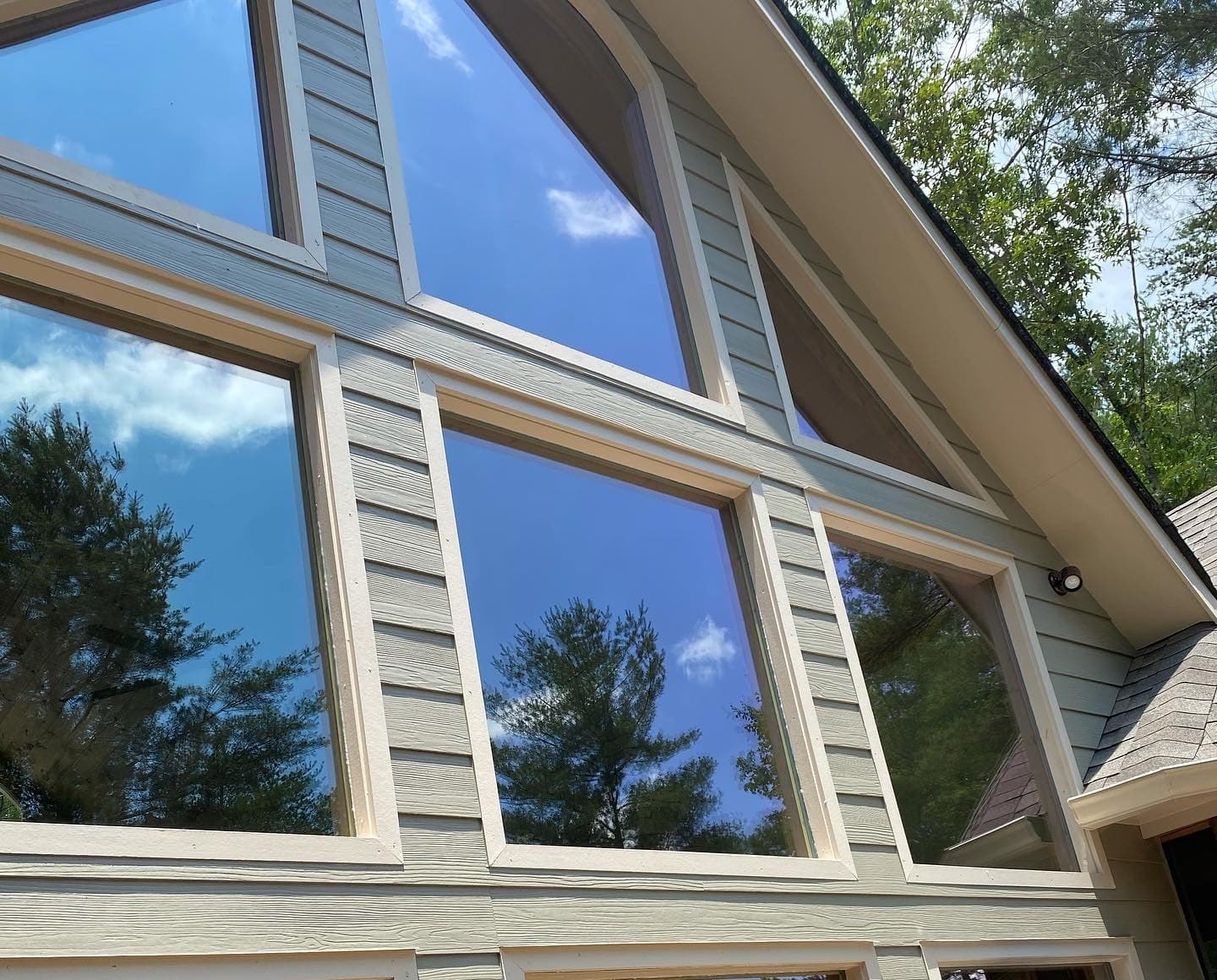 Residential window glass replacement installed in a home opening.